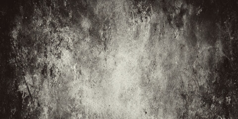 Dark and heavily distressed textured concrete surface ideal for modern industrial design.
