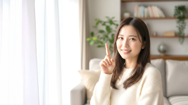 笑顔でピンポイントを教える若い女性と白いコピースペース　AI生成画像