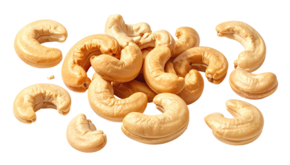 Heap of roasted cashew nuts, golden-brown and crescent-shaped