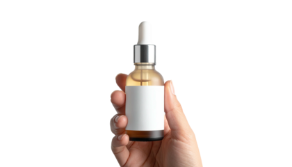 Hand holding a glass bottle with dropper against a black background