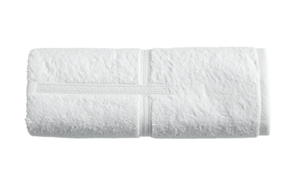 Folded, clean, fluffy white towel isolated on a black background