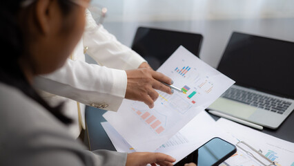 Business Team Discussing Financial Report and Data Analysis