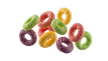 A colorful assortment of fruit flavored cereal loops isolated on transparent background