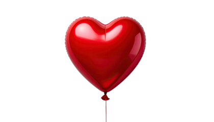 Inflated red heart balloon floating against stark black backdrop