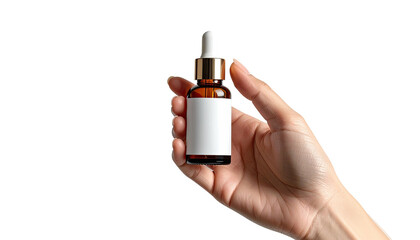 Hand holds amber dropper bottle with blank white label