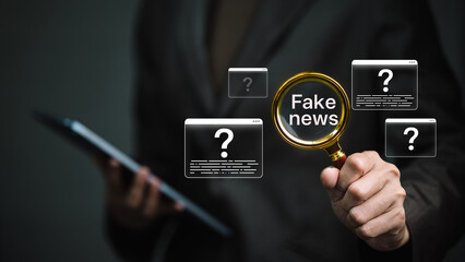 Fake News Detection Concept with Magnifying Glass and Digital Media Icons