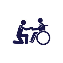 A dark blue icon depicting a person kneeling and holding the hand of another person in a wheelchair, symbolizing care and support