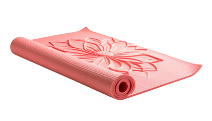 Rolled, pink yoga mat with stylized flower design on black background