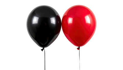 Balloons stark black & bright red, on dark. High-shine surface