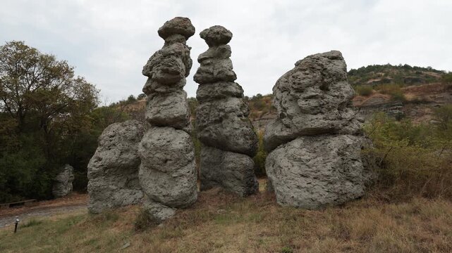 Natural stone town of Kuklica in northern Macedonia. Stone tables near the Kriva River