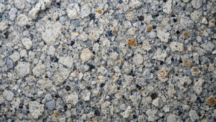 Close-Up View of Polished Granite Stone Surface With Intricate Textures and Patterns