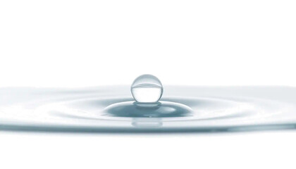 single clear water drop, realistic surface tension, soft reflection, clean lab aesthetic, isolated transparent background.
