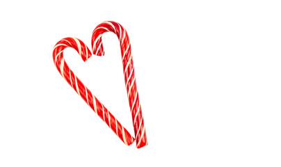 White background with heart made from Christmas candy canes