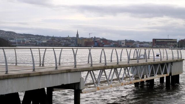 Pontoon on the River Foyle with the city of Derry Londonderry in the distance