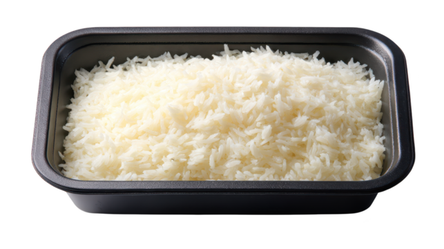 Cooked white rice rests in simple serving container steaming white grains are presented for eating