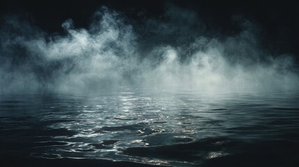 Fototapeta premium Soft mist rises from the still surface of the lake under a darkening sky creating an enchanting atmosphere.