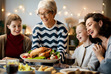 Family celebrating Thanksgiving Day