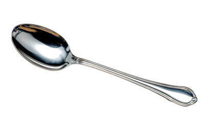 Close-up shot of a shiny, silver spoon with a long, elegant handle, isolated on white.