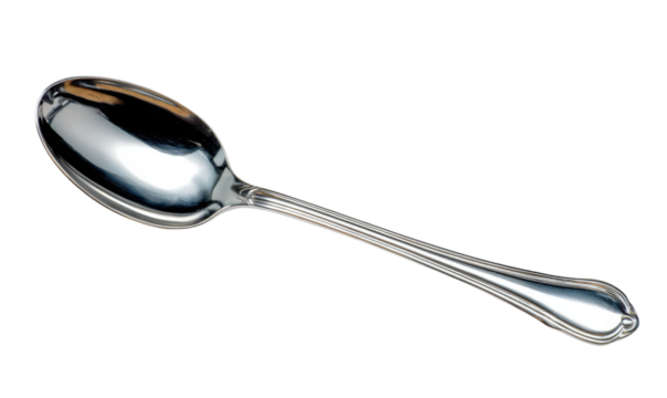 Close-up shot of a shiny, silver spoon with a long, elegant handle, isolated on white.