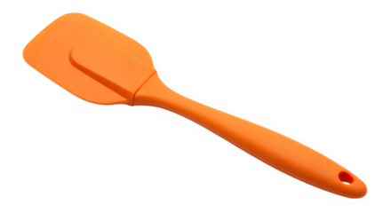 Close up of an orange silicone spatula tool kitchen cooking ware on black background