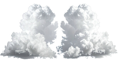 Two white, fluffy cloud formations against a dark background