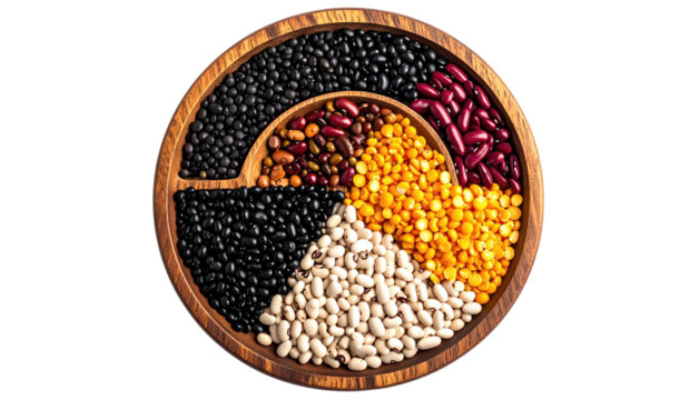 Assorted beans and lentils arranged in a segmented wooden dish