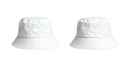 Two identical, solid white bucket hats against a black background