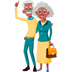 Elderly African American Couple Posing Together With A Handbag And Blue Shoes Standing Against A White Background