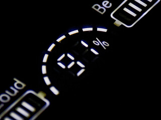 Digital display with eighty-one percent charge shows battery level on a dark background.