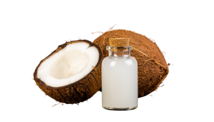 Fresh, cracked half coconut with white water and brown shell on an isolated white background for a healthy tropical food image.