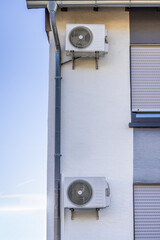 Air conditioner and heat pump split system  installed on modern city house