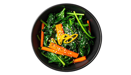 Green salad with carrots in black bowl, top view, on dark