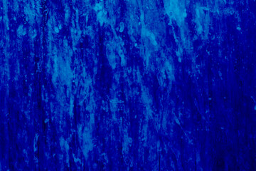 Rust is clinging to the dirty bathroom door.