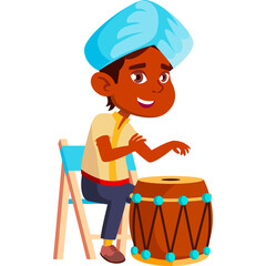 Indian Boy In Traditional Attire Sitting On Chair Playing Drum With Blue Turban And Yellow Shirt