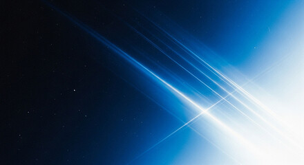 Fototapeta premium Abstract blue light streaks and particles against a dark starry background, representing speed and technology