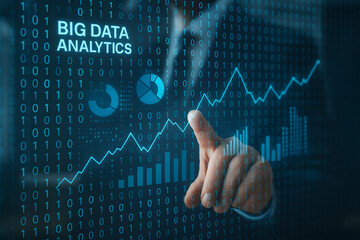 Data analysis insight: A close-up shot reveals a person's hand interacting with a dynamic digital display showcasing data analytics. The image captures the essence of data analysis.