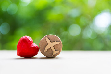 Travel insurance concept with Airplane icon and red heart. Travel, protection and insurance concept.