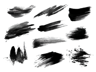 A collection of varied brush strokes in black, showcasing different textures and styles suitable for artistic applications.