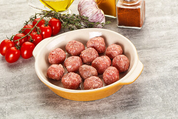 Uncooked raw beef meatball minced