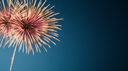 Fireworks illuminate the night sky with bursts of color and light, creating a dazzling spectacle of celebration and excitement, against a deep blue backdrop.