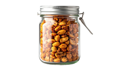 Glass jar full of peanuts with a metal lid against black