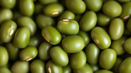 A close-up shot captures a cluster of vibrant green mung beans. Their smooth, rounded shapes are clustered together, creating a textured mosaic of natural beauty. 175/180