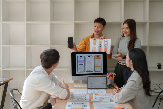 Product team collaborating on mobile app uiux design