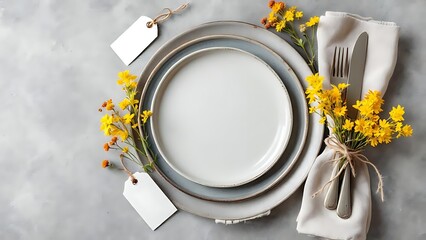 Rustic table setting with vintage wooden cutlery tied with string, linen napkin, ceramic plates, and yellow wildflowers on a textured stone background. Natural, minimal, organic style