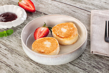 Cottage cheese pancakes - Syrniki for breakfast