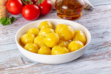 Boiled young potato with oil
