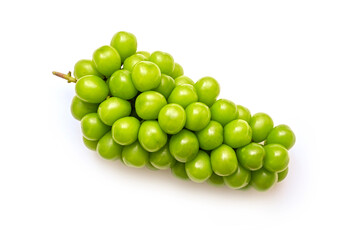 Branch of large yellow-green grape Shine Muscat isolated on white, top view