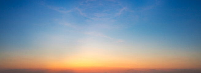 Sunset sky background. Panoramic view of sunset sky.