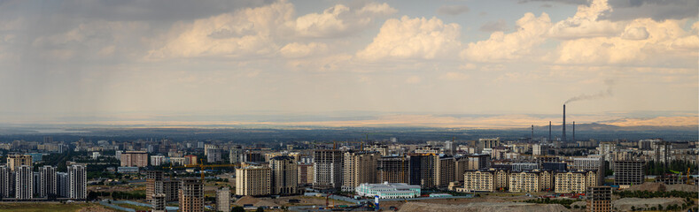 Panorama of Bishkek, Kyrgyzstan at cloudy summer day.