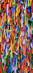 Surface covered with ribbons of fabric of all colors